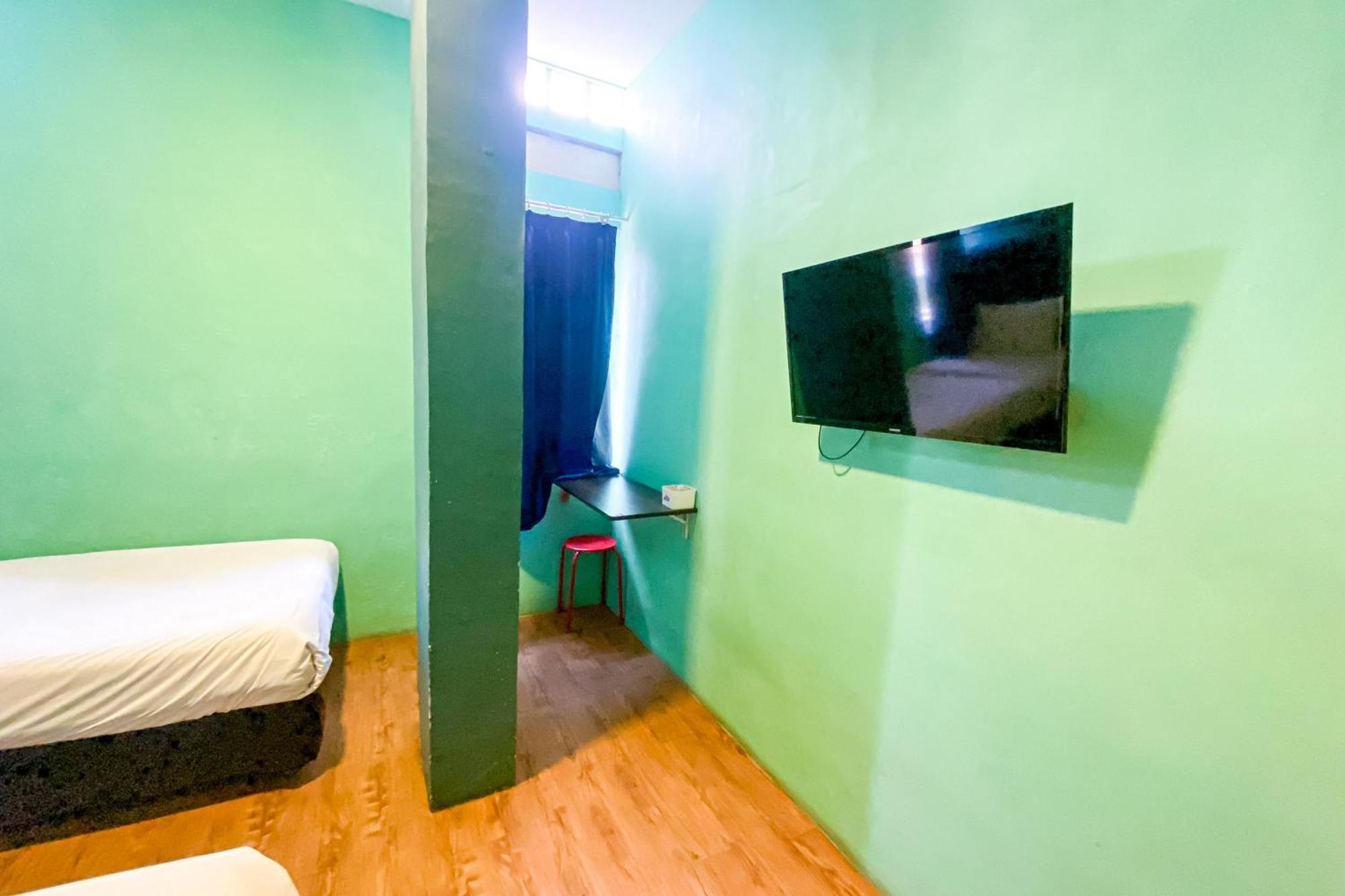 Hotel Reddoorz At Sentosa Jaya Helvetia à Medan Extérieur photo